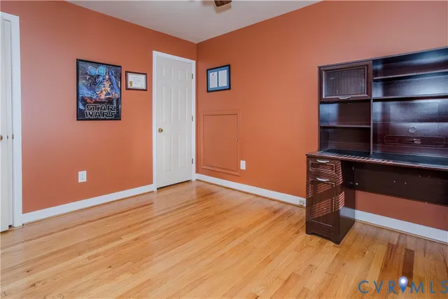 a view of workspace with wooden floor