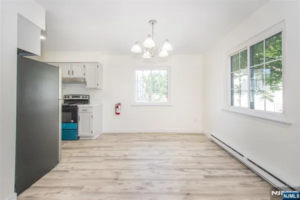 a bathroom with a sink toilet and mirror