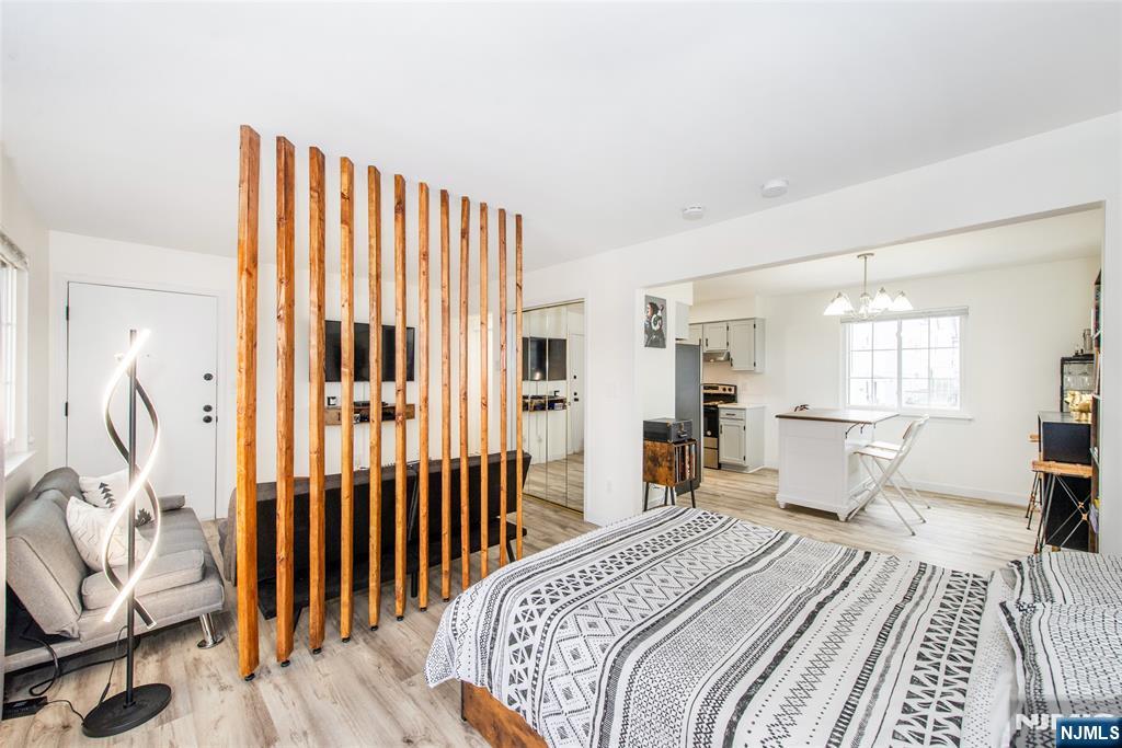 79 Getty Avenue, Unit 4B Clifton, NJ 07011 - Photo 27 of 30 a bed room with a bed and a window