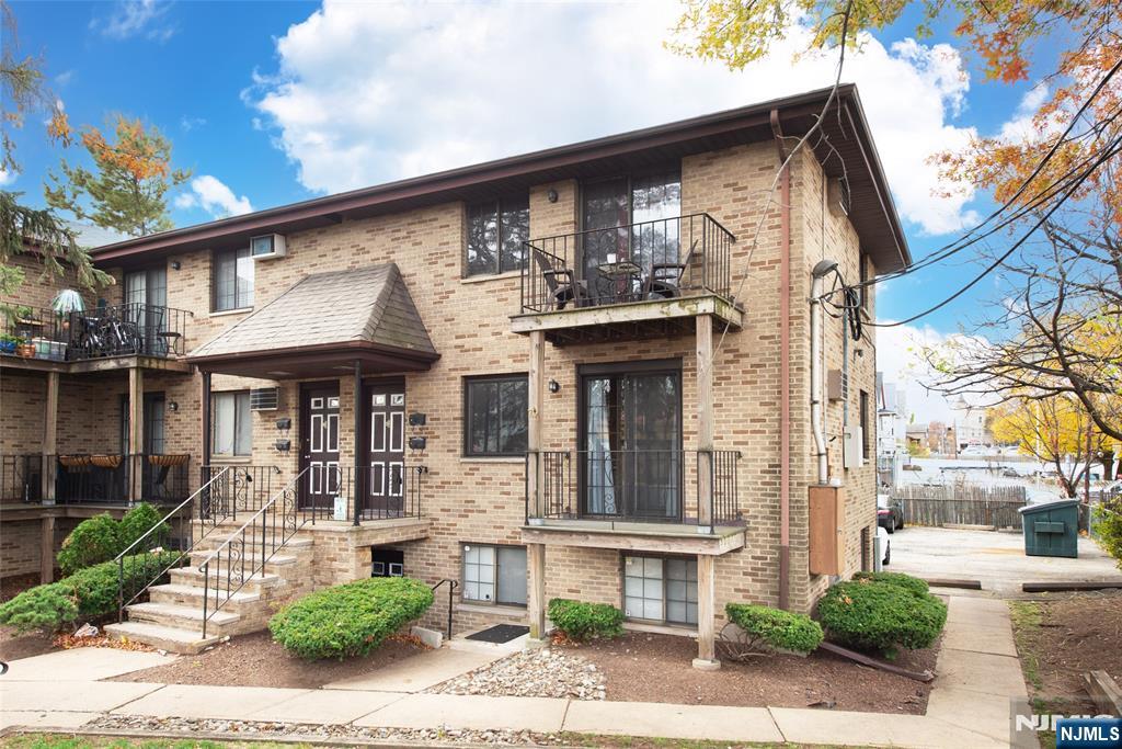 79 Getty Avenue, Unit 4B Clifton, NJ 07011 - Photo 7 of 30 a front view of a house with garden
