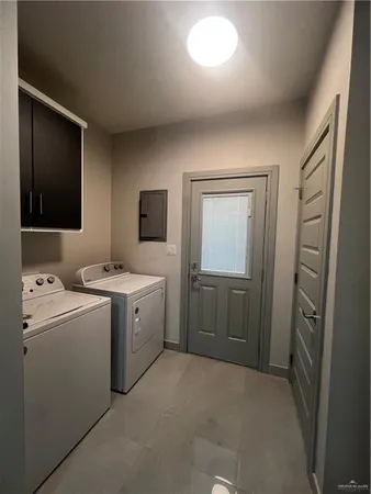 a view of utility room with washer and dryer