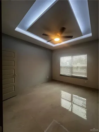 a view of an empty room and window