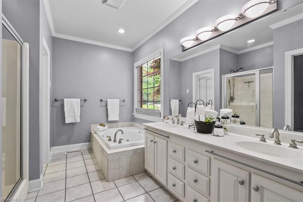 8300 Trottington Road Stokesdale, NC 27357 - Photo 19 of 48 primary suite