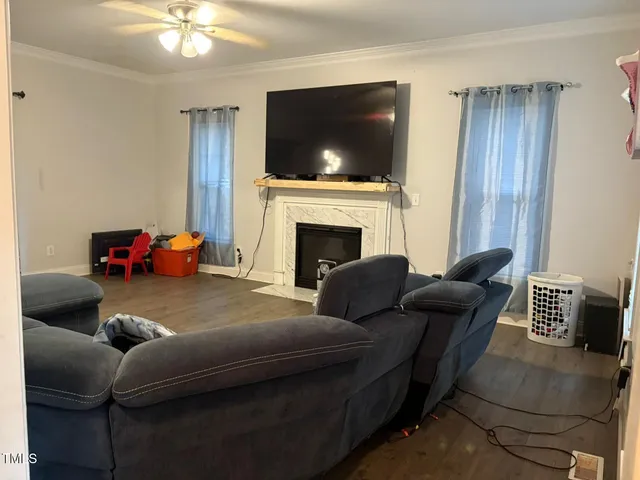 a view of staircase with white walls and a window