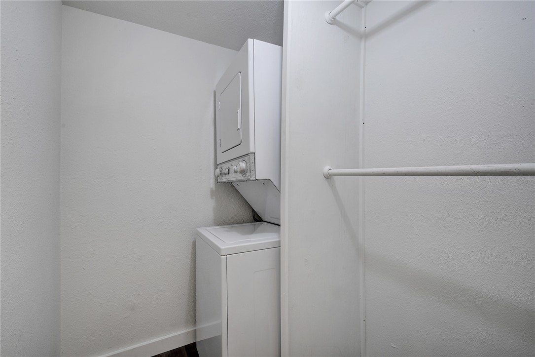 4111 Avenue A, Unit 108 Austin, TX 78751 - Photo 12 of 17 a utility room with dryer and washer