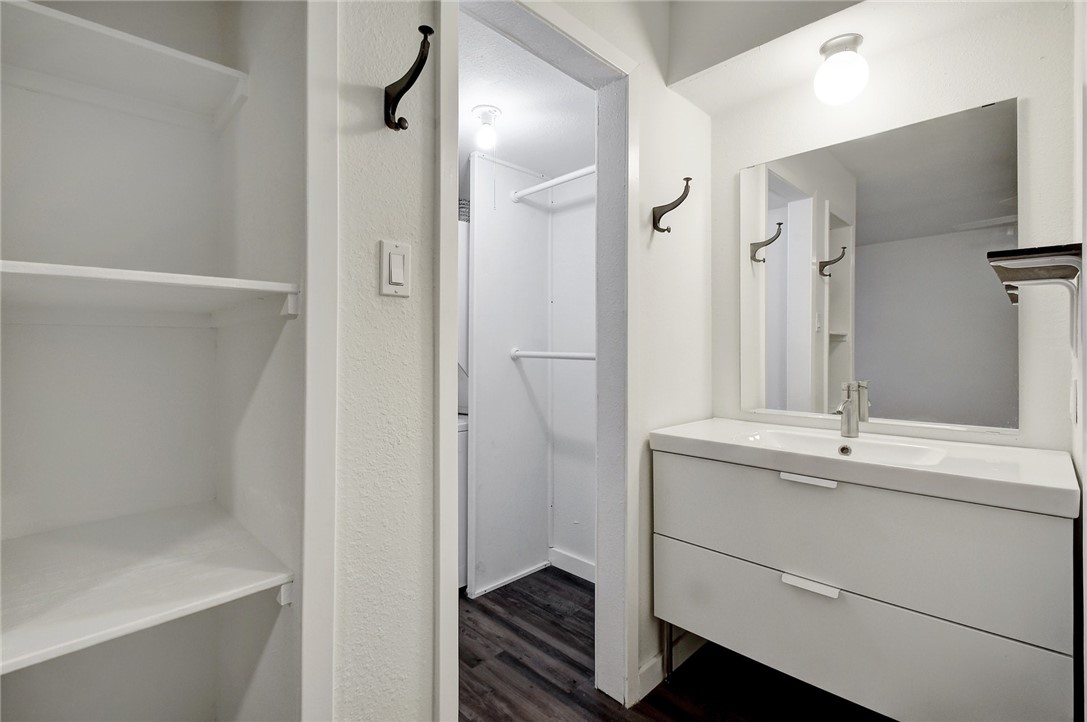 4111 Avenue A, Unit 108 Austin, TX 78751 - Photo 13 of 17 a bathroom with a sink and a mirror