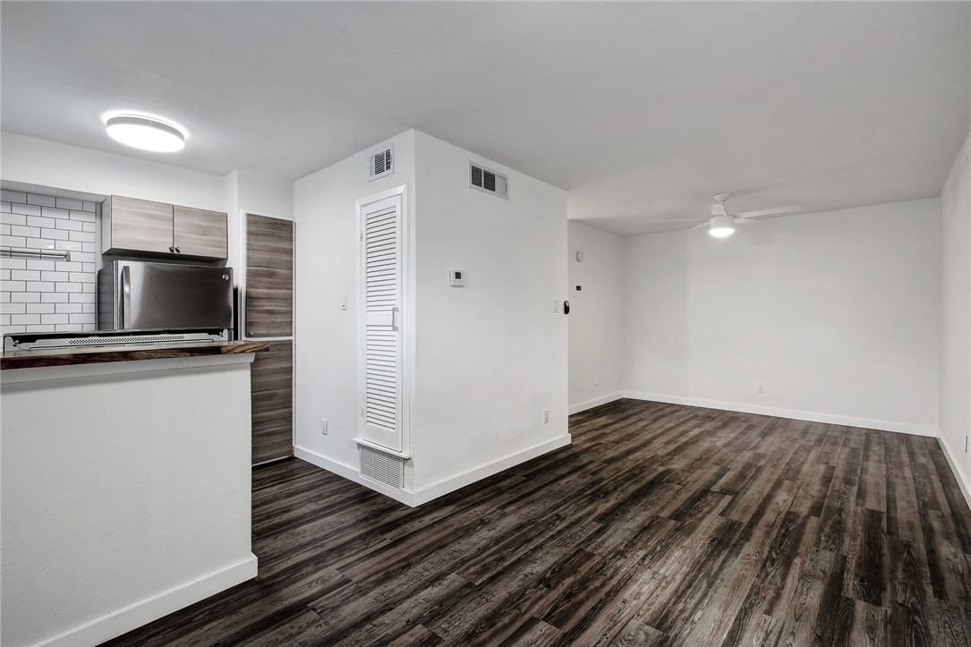 4111 Avenue A, Unit 108 Austin, TX 78751 - Photo 5 of 17 a view of a livingroom with wooden floor