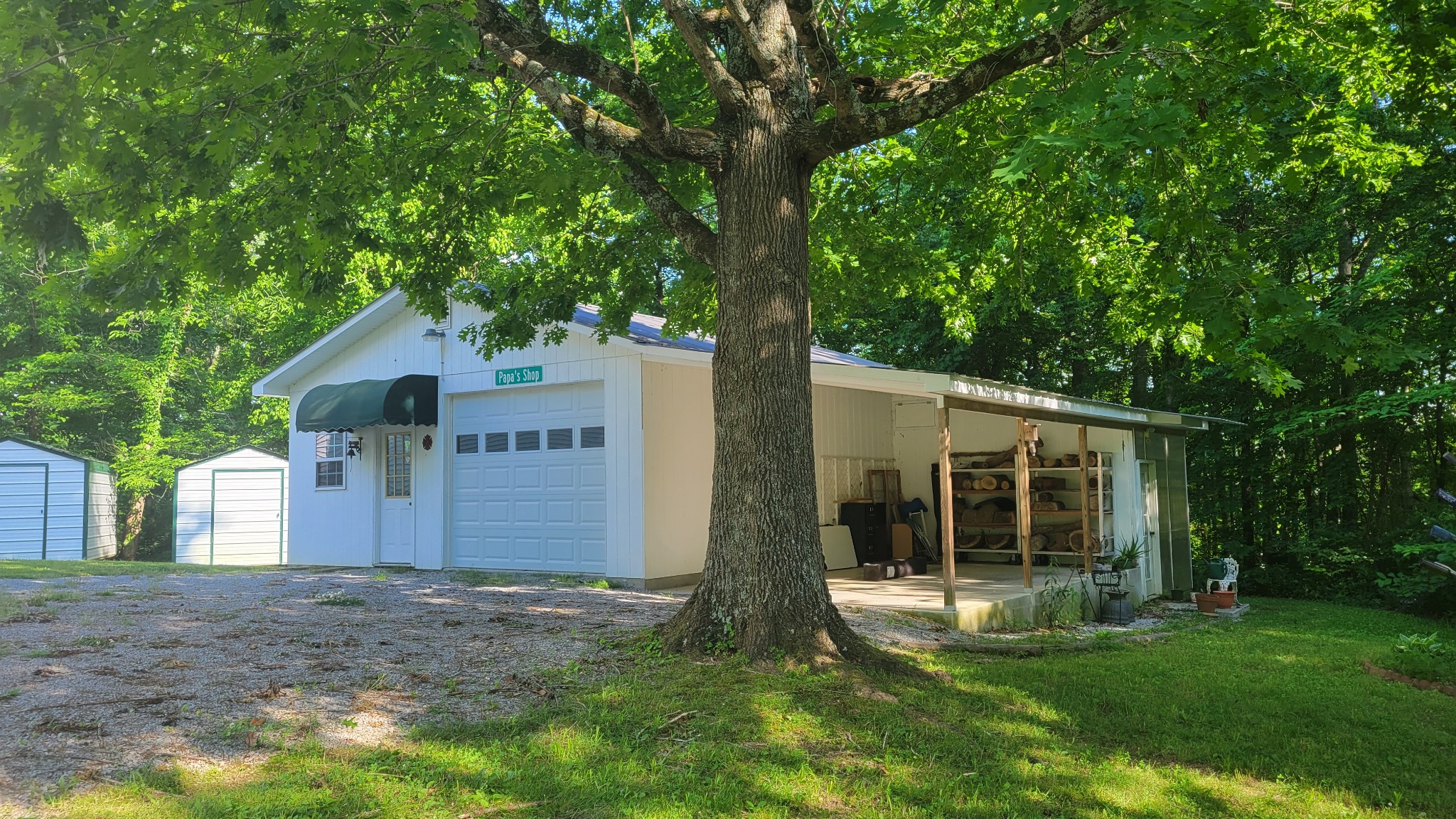220 Racetrack Road Pulaski, TN 38478 - Photo 3 of 32 a house view with a garden space