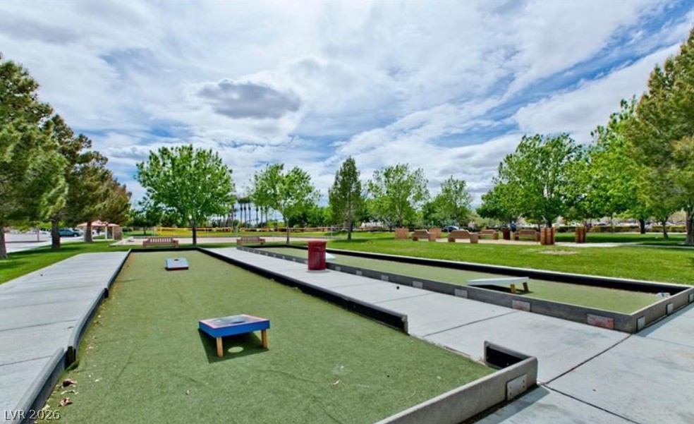 6405 North Raptor Court North Las Vegas, NV 89084 - Photo 61 of 66 Green spaces and pathways invite outdoor activities in this vibrant community park.