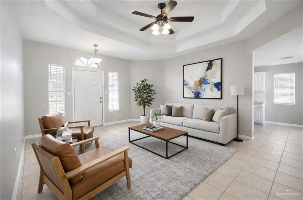 2115 East 29th Street Mission, TX 78574 - Photo 3 of 18 a living room with furniture and a chandelier