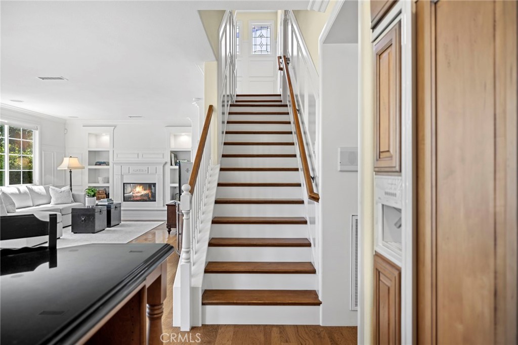 30 Baudin Circle Ladera Ranch, CA 92694 - Photo 27 of 75 a view of entryway and hall with wooden floor