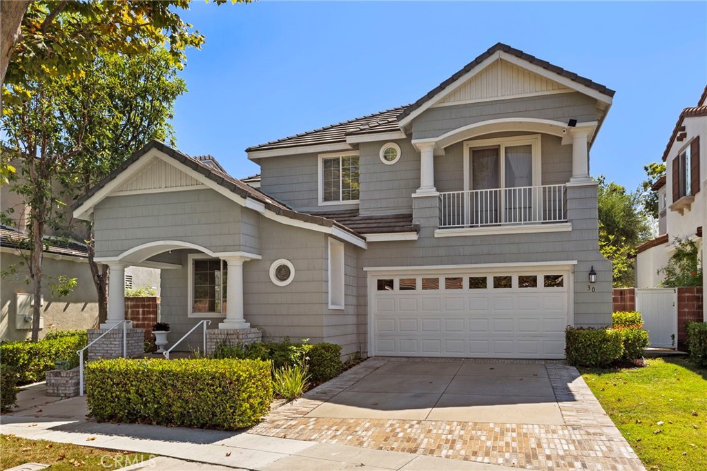 30 Baudin Circle Ladera Ranch, CA 92694 - Photo 47 of 75 a front view of a house with a yard