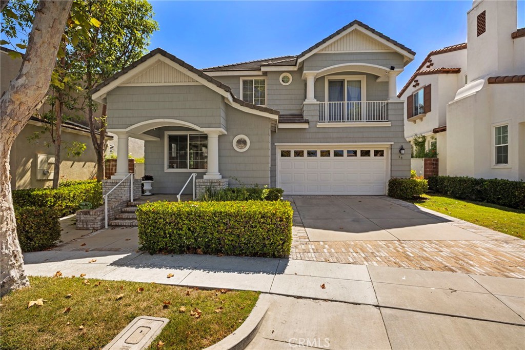 30 Baudin Circle Ladera Ranch, CA 92694 - Photo 50 of 75 a front view of a house with garden