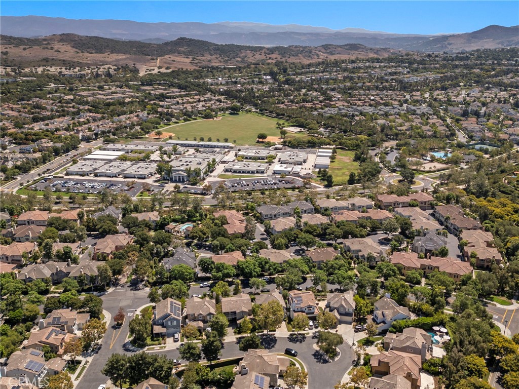 30 Baudin Circle Ladera Ranch, CA 92694 - Photo 59 of 75 an aerial view of residential houses with outdoor space and trees