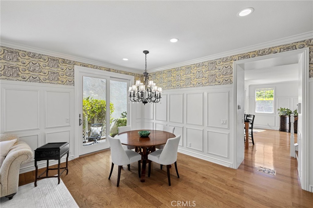 30 Baudin Circle Ladera Ranch, CA 92694 - Photo 8 of 75 a view of a dining room with furniture and chandelier