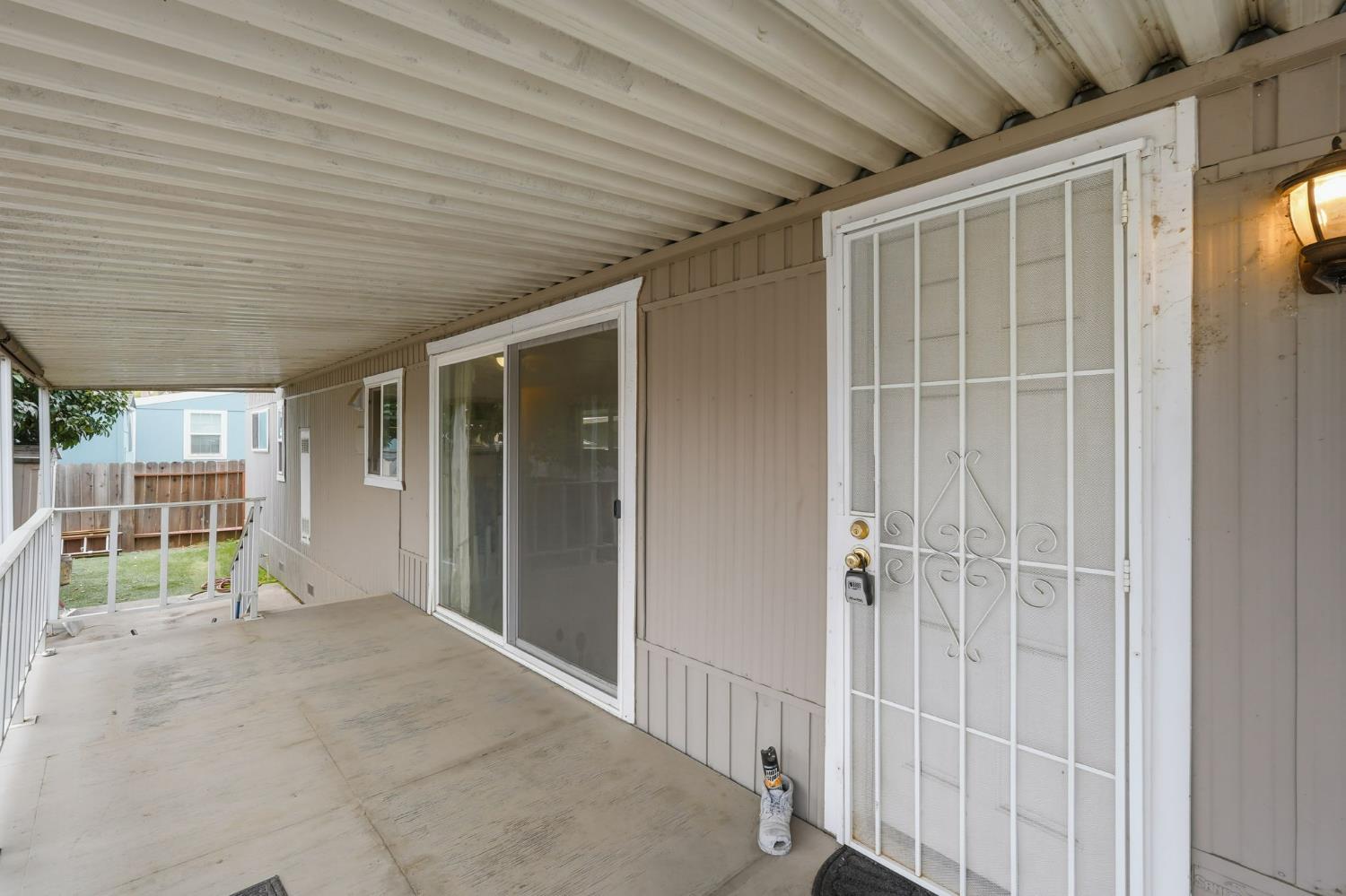 15820 Harlan Road, Unit 85 Lathrop, CA 95330 - Photo 5 of 27 a view of livingroom with an outdoor space