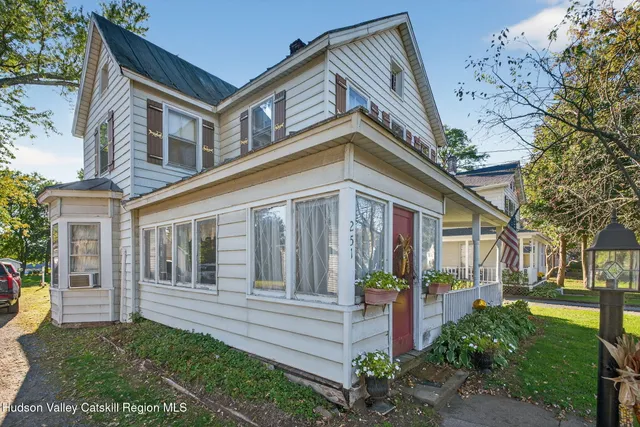 front view of house with a yard