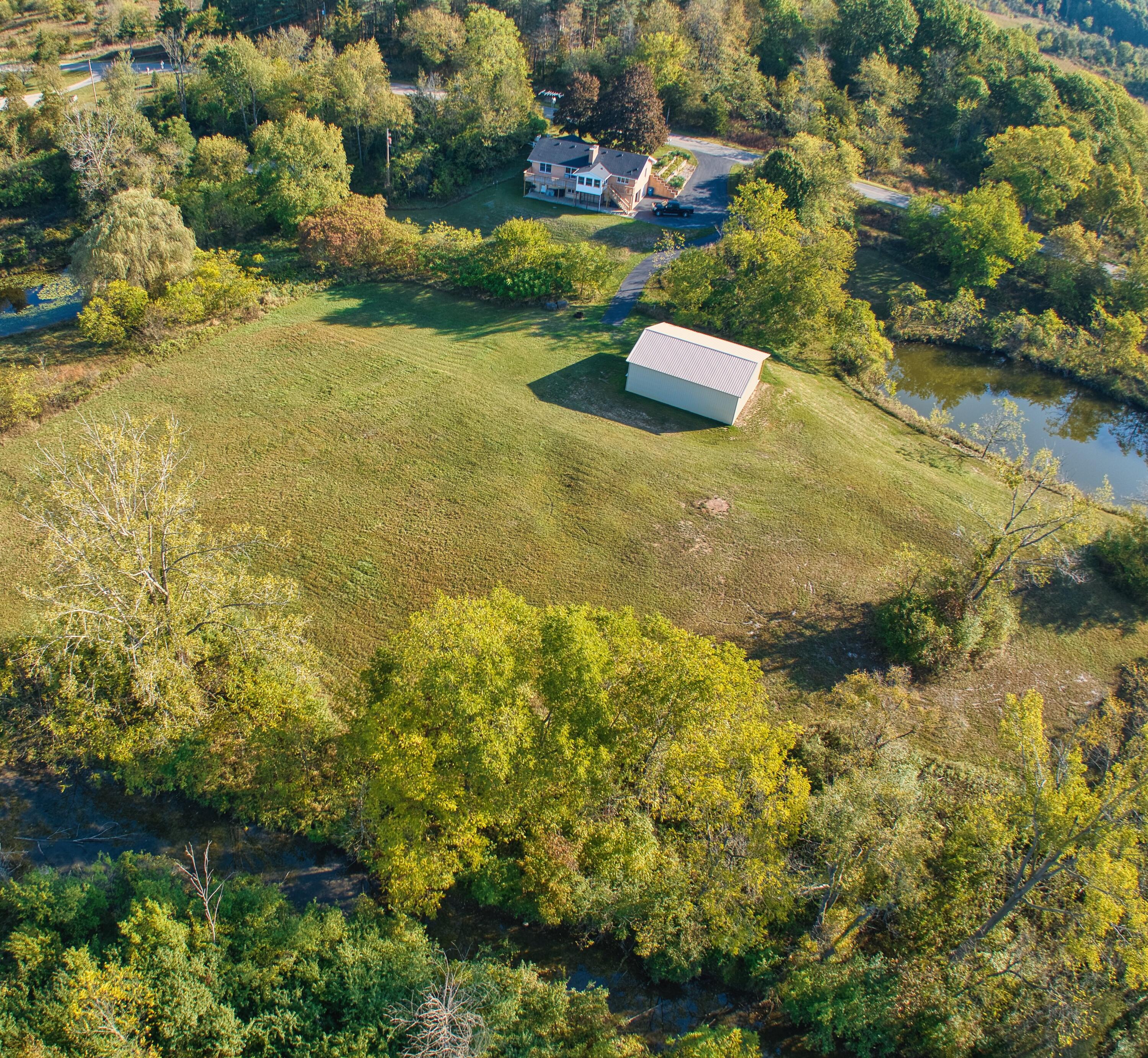 3400 Bird Lake Road South Osseo, MI 49266 - Photo 3 of 44 3400BirdLakeS - CDS - 9-27-25_56