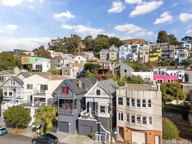 a view of a town with many windows