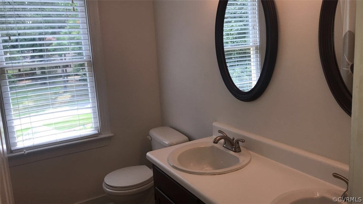 9120 Quail Ridge Road Chesterfield, VA 23832 - Photo 28 of 30 a bathroom with a sink and a mirror