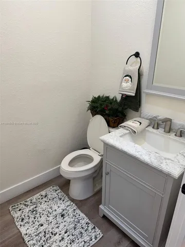 a bathroom with a toilet and a sink