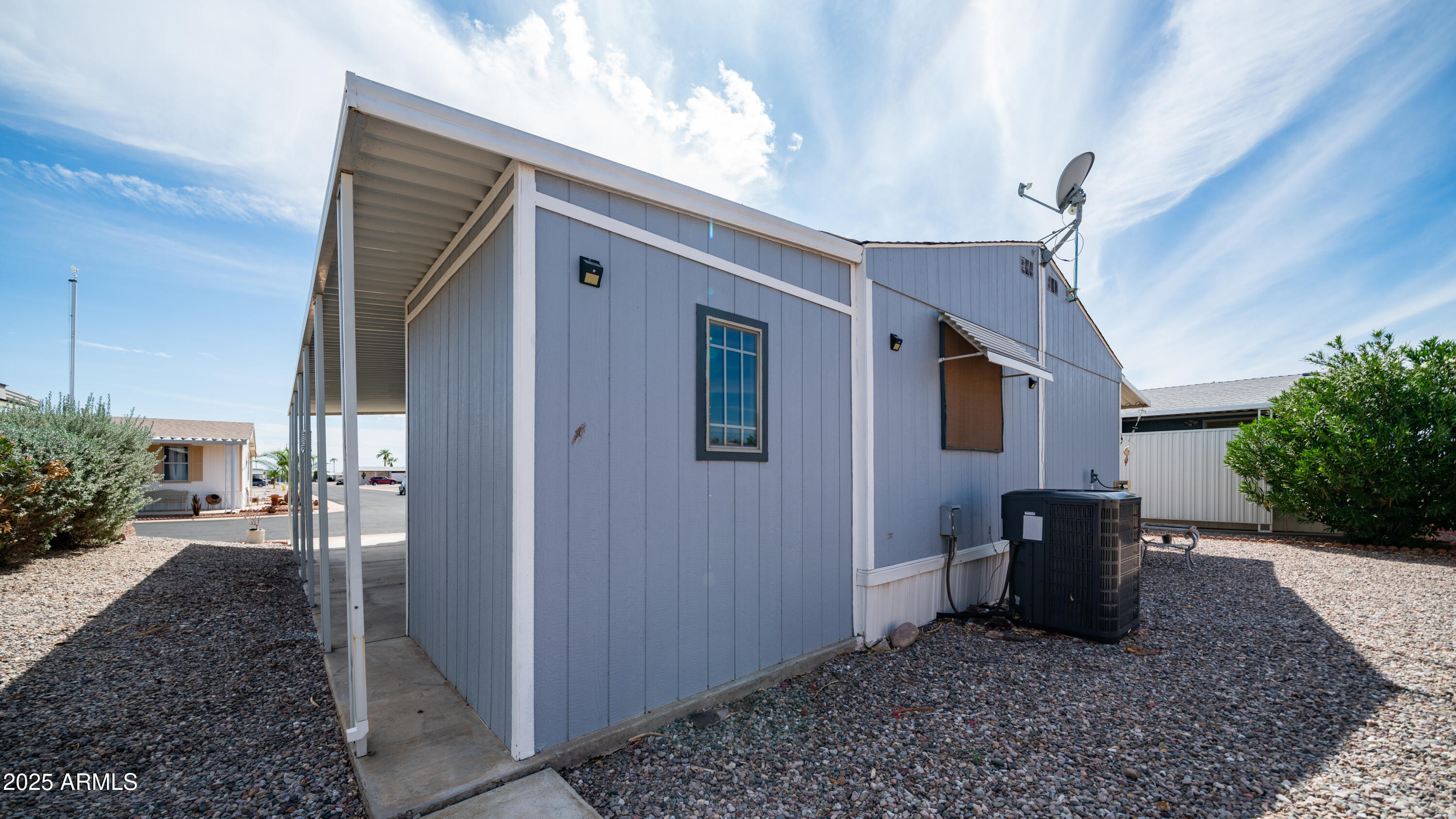 301 South Signal Butte Road, Unit 51 Apache Junction, AZ 85120 - Photo 11 of 32 a view of a porch with seating space
