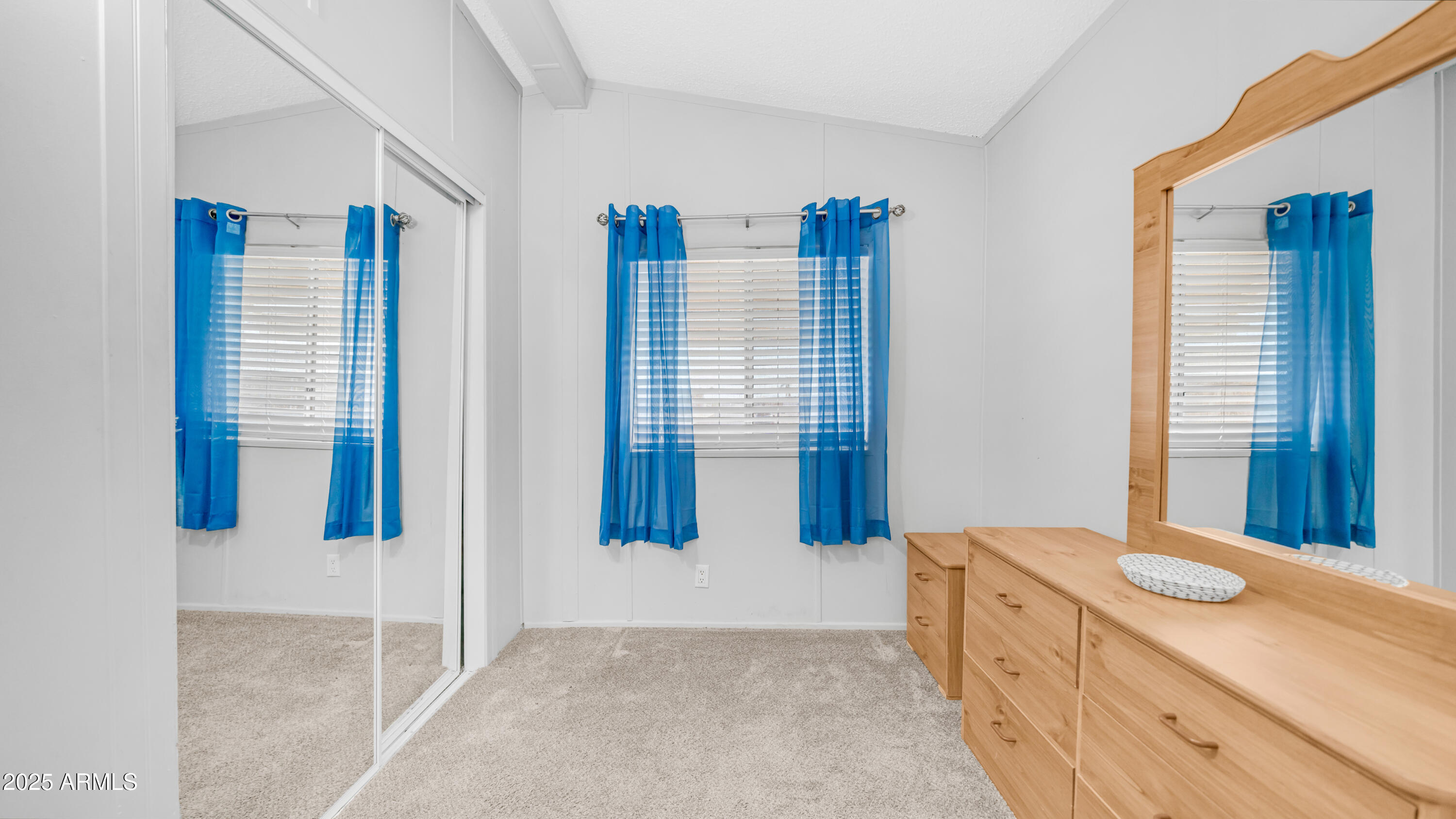 301 South Signal Butte Road, Unit 51 Apache Junction, AZ 85120 - Photo 17 of 32 a bathroom with a sink and a mirror