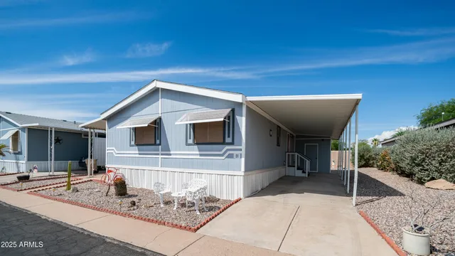 a backyard of a house with seating space