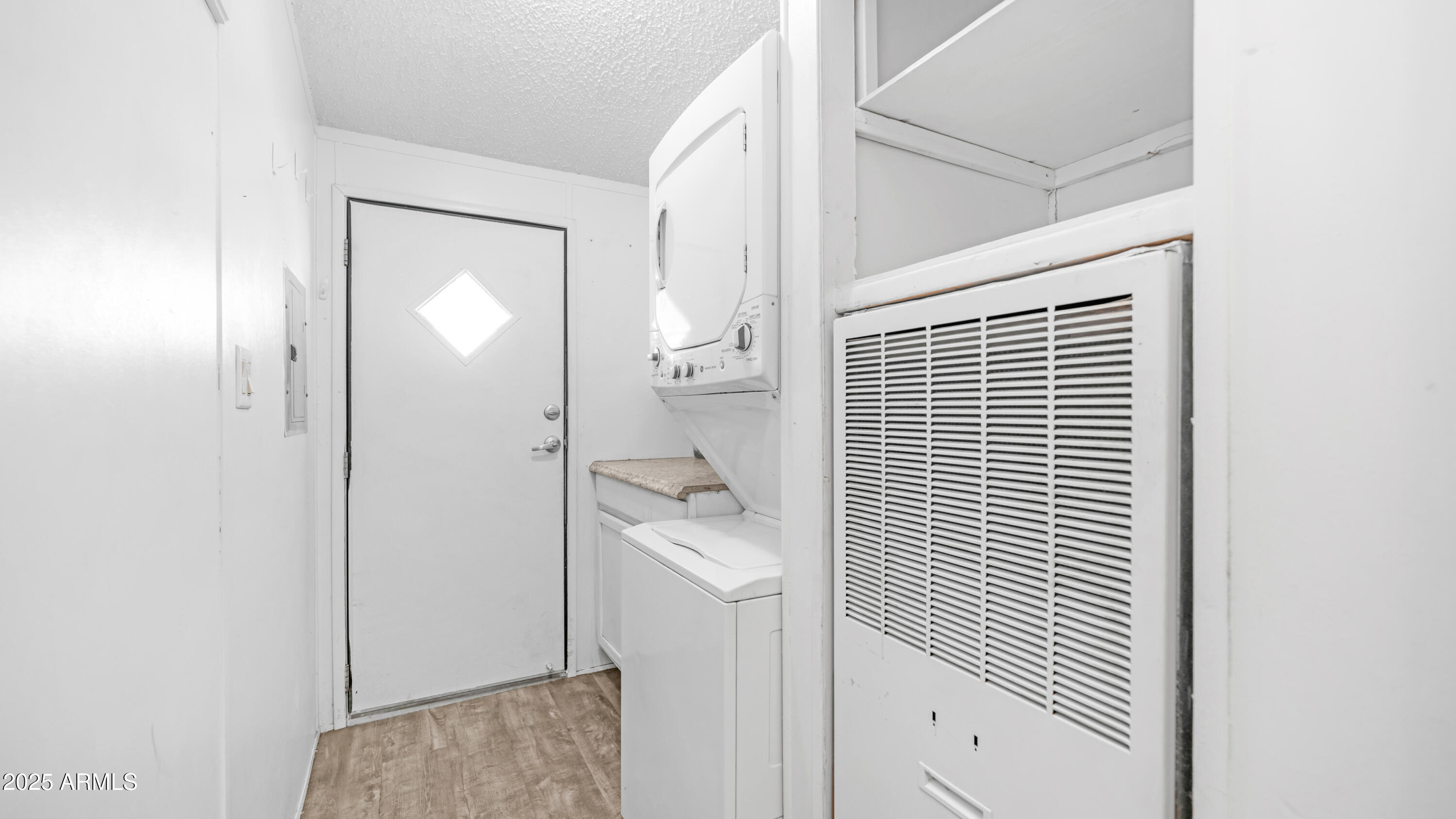 301 South Signal Butte Road, Unit 51 Apache Junction, AZ 85120 - Photo 21 of 32 a bathroom with a sink a toilet and shower