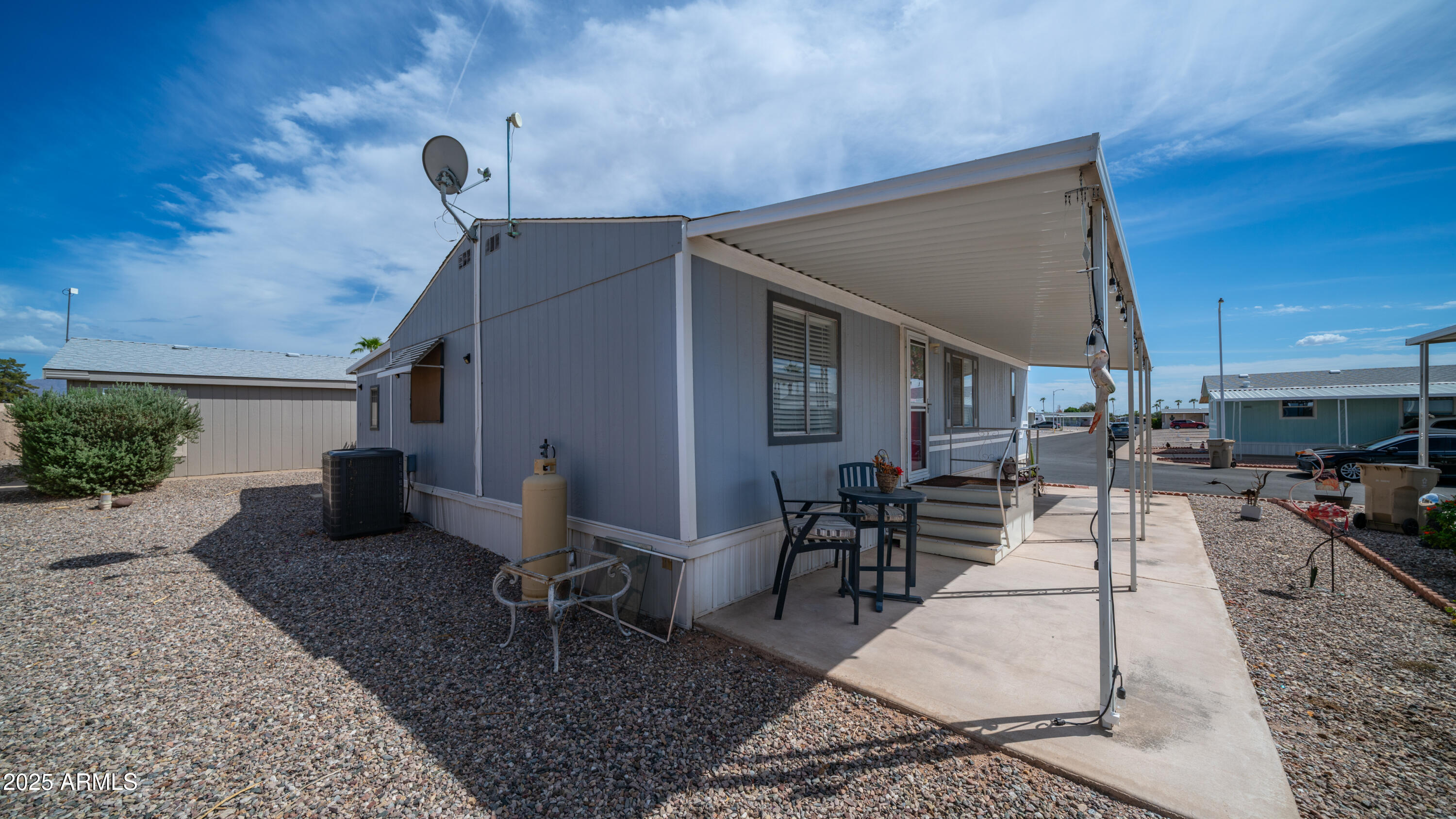 301 South Signal Butte Road, Unit 51 Apache Junction, AZ 85120 - Photo 9 of 32 a house view with a sitting space
