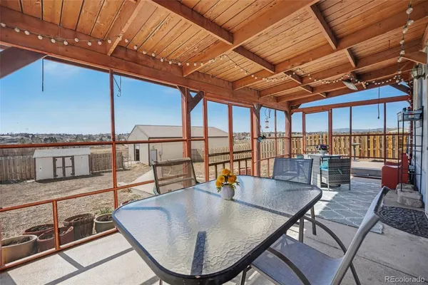 a outdoor dining space with furniture