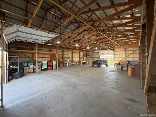 a view of a garage with storage