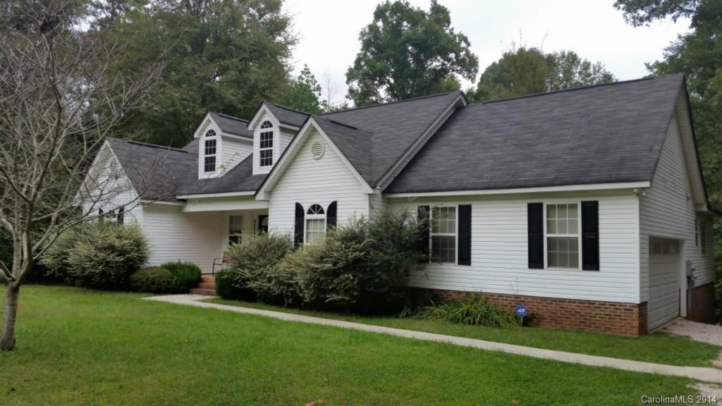 7003 Providence Road South Waxhaw, NC 28173 - Photo 1 of 20 a front view of house with yard and green space