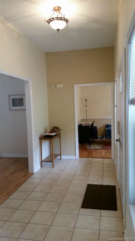 7003 Providence Road South Waxhaw, NC 28173 - Photo 2 of 20 a view of a hallway with seating area
