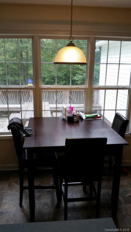 7003 Providence Road South Waxhaw, NC 28173 - Photo 11 of 20 a view of a dining room with furniture window and outside view