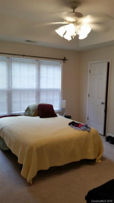 7003 Providence Road South Waxhaw, NC 28173 - Photo 16 of 20 a bedroom with a bed and a window