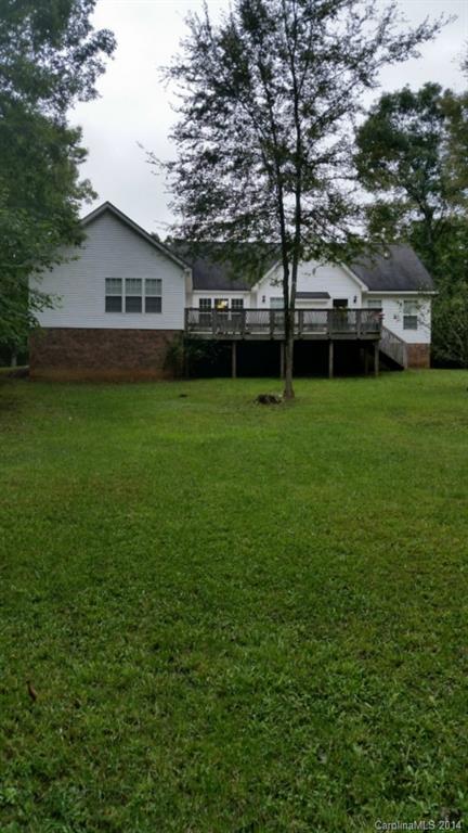 7003 Providence Road South Waxhaw, NC 28173 - Photo 20 of 20 a front view of a house with a garden