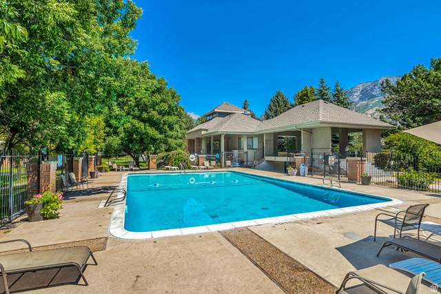 3221 North Shadowbrook Circle Provo, UT 84604 - Photo 22 of 29 Outdoor swimming pool with integrated steps and concrete surround