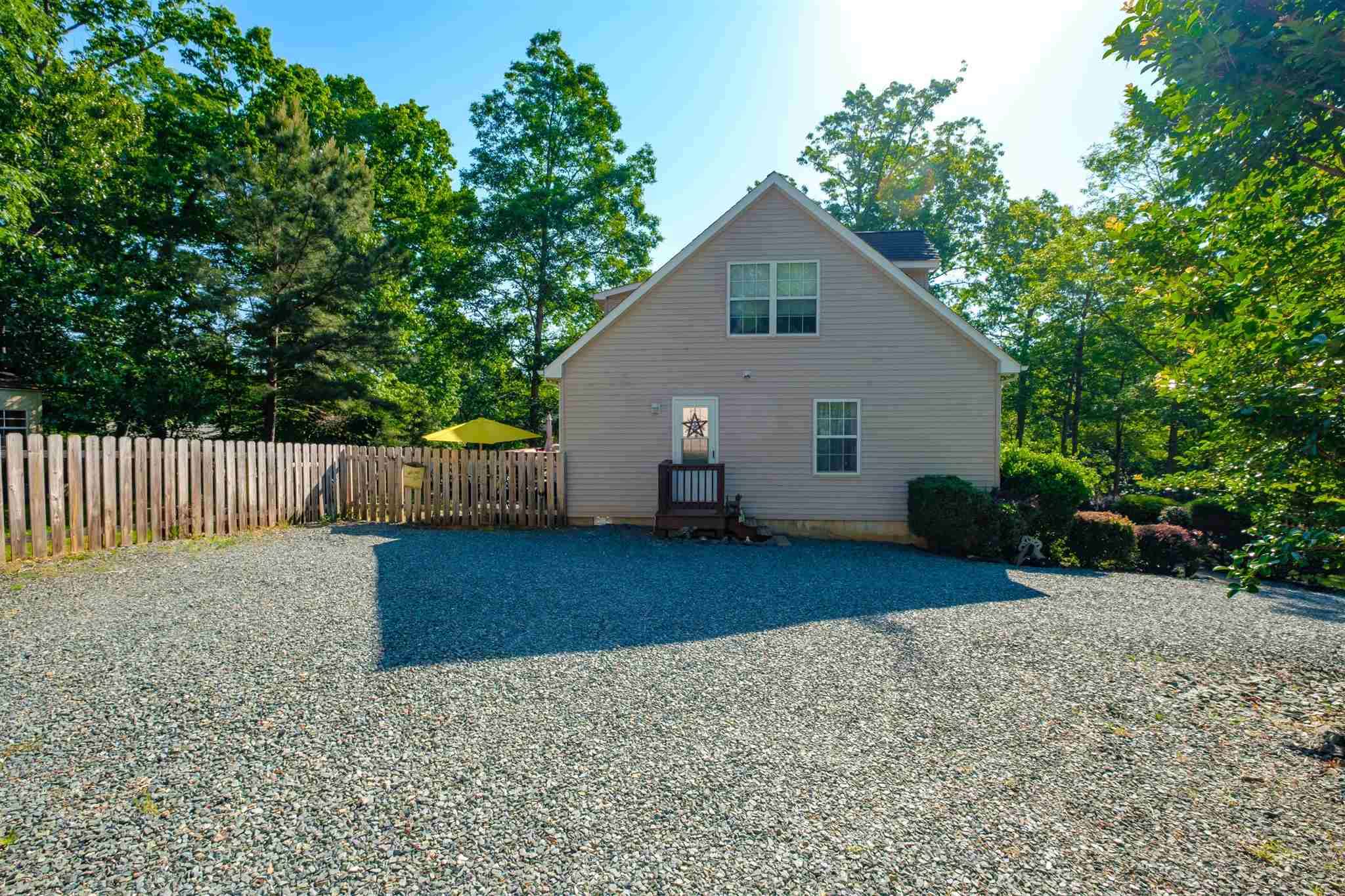 20 Brougham Road Palmyra, VA 22963 - Photo 28 of 44 a view of backyard and house with wooden fence