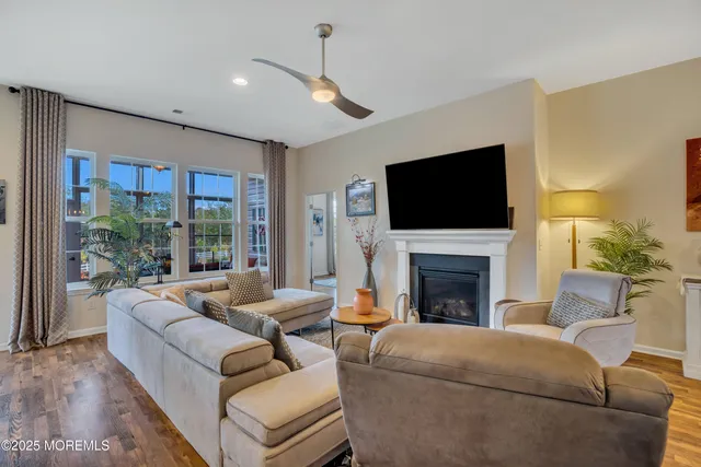 a living room with furniture and a table