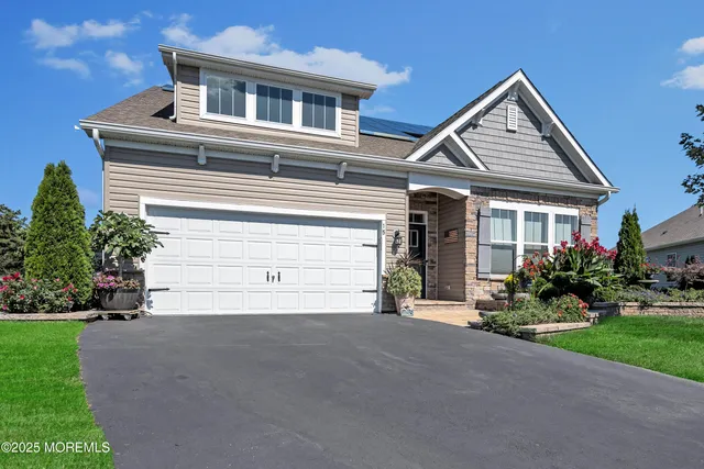 a house view with a garden space