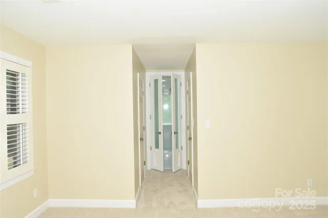 a bathroom with a shower and sink