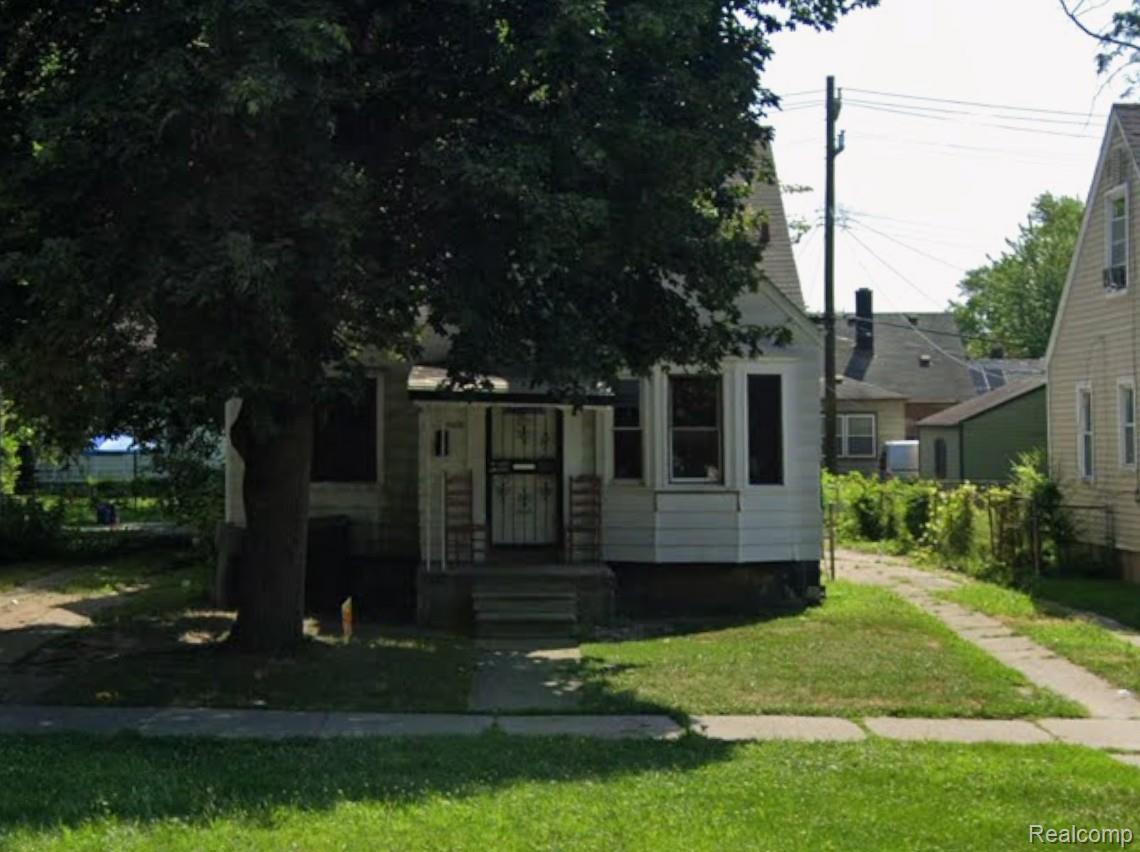 11350 Evergreen Road Detroit, MI 48228 - Photo 1 of 1 Single-family residence featuring a prominent mature tree in the front yard
