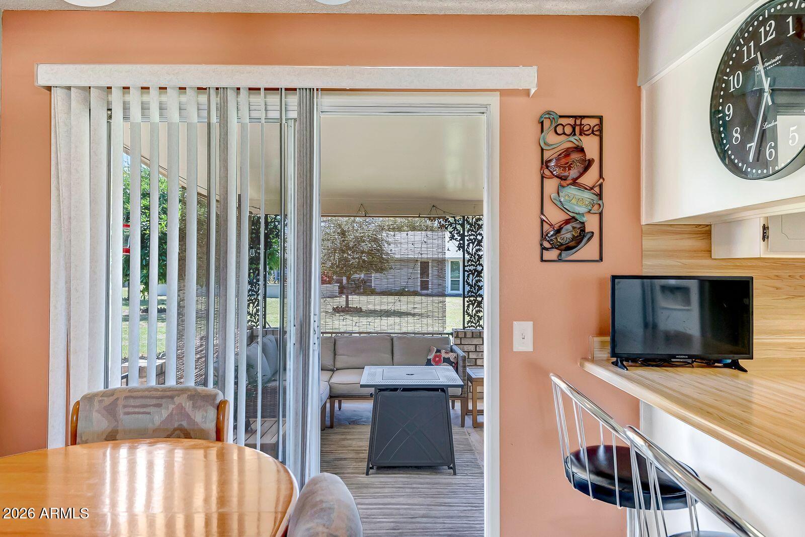 9613 West Oak Ridge Drive Sun City, AZ 85351 - Photo 11 of 31 sc - dining bk patio