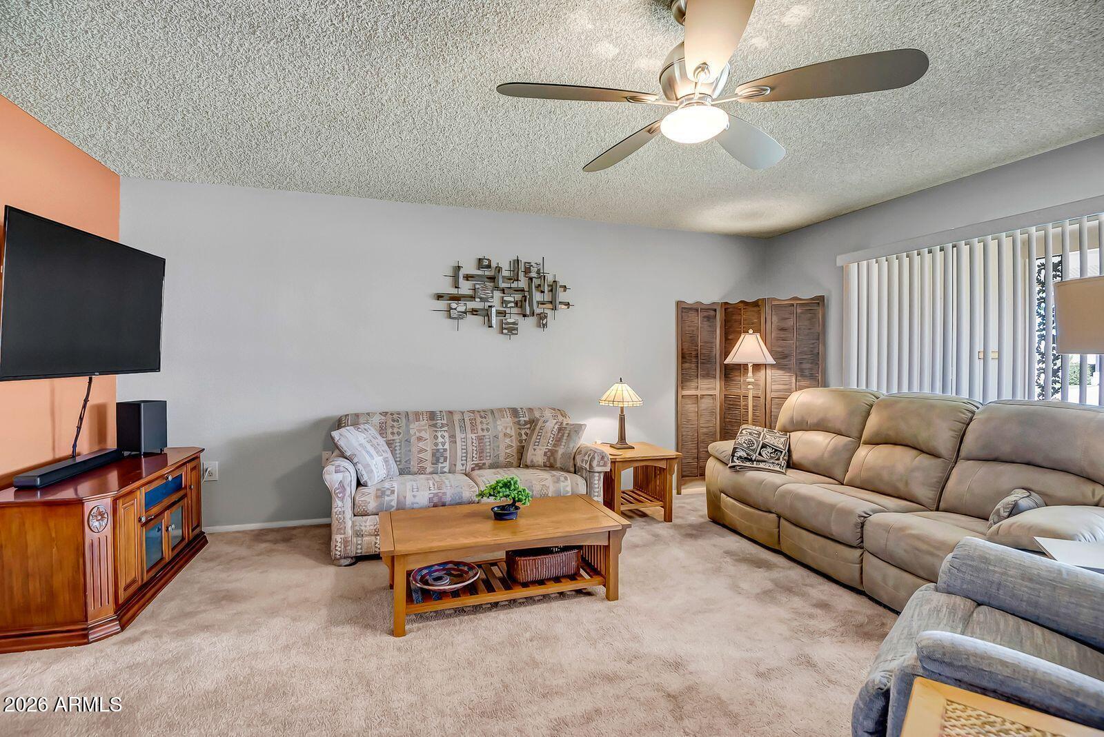 9613 West Oak Ridge Drive Sun City, AZ 85351 - Photo 7 of 31 sc - living room 3