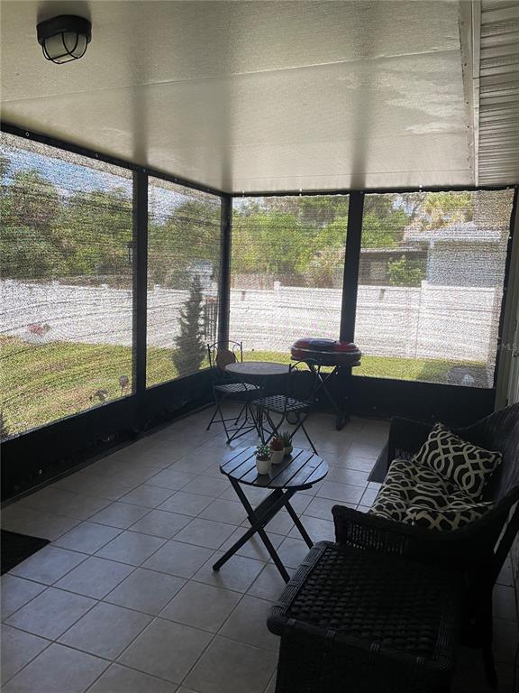 575 Tiberon Cove Road Longwood, FL 32750 - Photo 40 of 56 a living room with couch and a large window