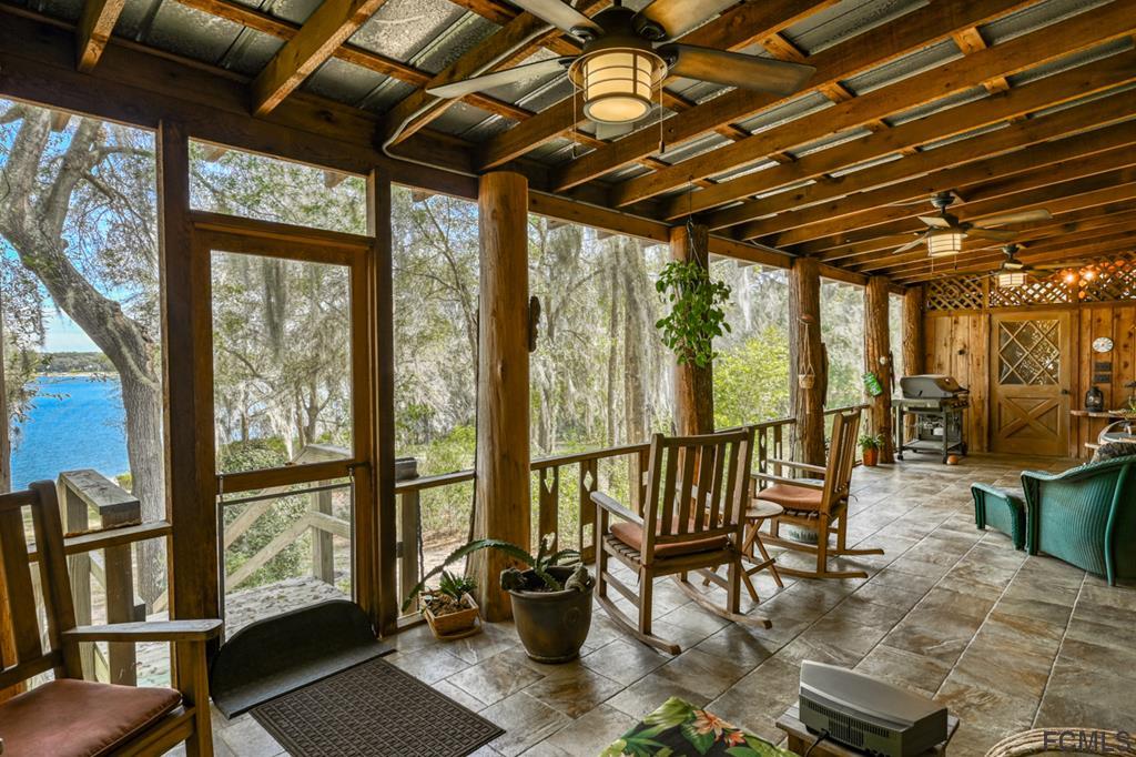 375-397 Southeast County Road Starke, FL 32091 - Photo 22 of 75 a view of a living room and balcony with furniture