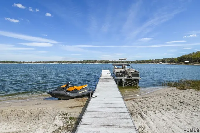 a view of a door and a sink