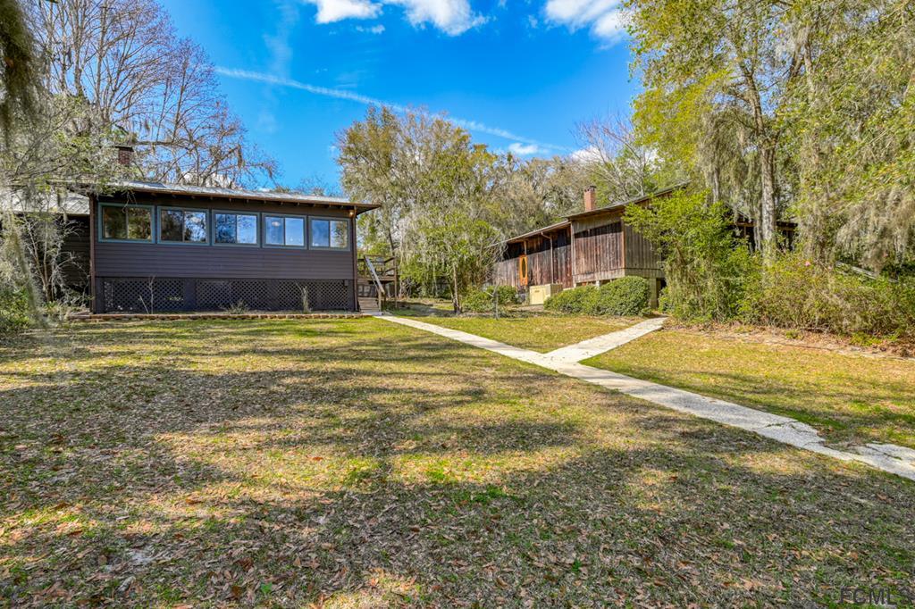 375-397 Southeast County Road Starke, FL 32091 - Photo 31 of 75 a view of a house with a yard