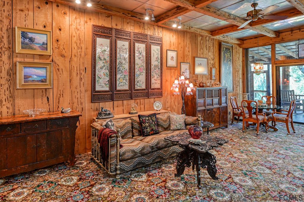 375-397 Southeast County Road Starke, FL 32091 - Photo 33 of 75 a living room with furniture and large windows